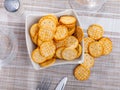 Portion of round crackers served in bowl