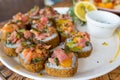 Crunchy sushi roll plate with salmon and ciboulette