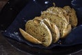 Crunchy wholemeal bread on a dark background, rustic homemade ba