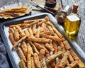 Crunchy zucchini sticks on a baking tray