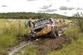 Crush Beige Jeep Rubicon crossing mud obstacle Royalty Free Stock Photo