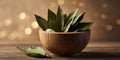 Crushed bay leaf in a wooden cup A whole bay leaf. Royalty Free Stock Photo