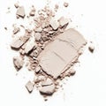 Crushed beige compact powder on white surface Royalty Free Stock Photo