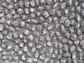 Crushed Black stone Decorative Gravel Aggregate wall for protection. basalt wall Royalty Free Stock Photo