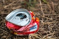 Crushed can in nature Royalty Free Stock Photo