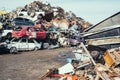 Crushed cars stacked up for recycling.