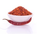 Crushed Chillies in the white ceramic bowl isolated