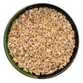Crushed Emmer farro hulled wheat groats isolated