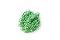 Crushed green eye shadow isolated on white background Royalty Free Stock Photo