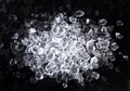 Crushed ice on black background. Top view, copy space Royalty Free Stock Photo