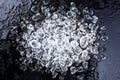Crushed ice on black background. Top view Royalty Free Stock Photo