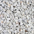 Crushed marble seamless texture. Small white stones background