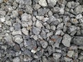 Crushed metallurgical slag. Large pieces of rubble with traces of rust. Prepared for sale. Waste metallurgical production.