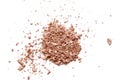 Crushed nude shimmer eye shadow texture  on white background. Face powder, bronzer swatch. Broken eye shadow smear. Cosmet Royalty Free Stock Photo