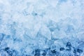 Crushed pieces of ice with snow background texture Royalty Free Stock Photo