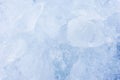 Crushed pieces of ice with snow background texture Royalty Free Stock Photo