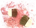 Crushed pink make up powder with cosmetic blush.