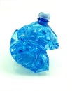 Crushed plastic bottle isolated