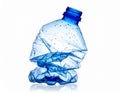 Crushed Plastic Water Bottle on White Background Waste & Recycling Concep generative ai Royalty Free Stock Photo