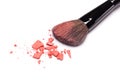 Crushed powder blush orange color with makeup brush Royalty Free Stock Photo