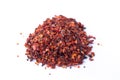 Crushed red chilli pepper cayenne flakes isolated on white background Royalty Free Stock Photo