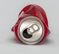 Crushed red cola can isolated on a white background