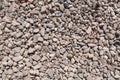 Crushed rock close up. Small rocks ground. Small crushed stone, construction material rock, gravel texture Royalty Free Stock Photo