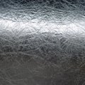 Crushed silver tinfoil as a textured background Royalty Free Stock Photo
