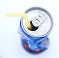 Crushed Soda Can with Straw