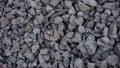 Crushed stone mounds.Grey crushed stones in close up,Versatile building material for horticulture,landscape gardening or road