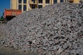 Crushed stone mounds.Grey crushed stones in close up,Versatile building material for horticulture,landscape gardening or road