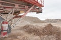 Crushing machinery working on the open pit quarry