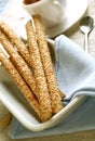 Crust sticks with sesame on plate Royalty Free Stock Photo