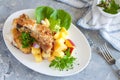 Crusted cod with peach and pineapple salsa Royalty Free Stock Photo