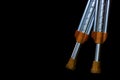 Crutches closeup isolated on a black background. The concept of the image