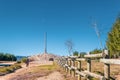 Cruz de Ferro, Spain - A Pilgrim Approaching the Iron Cross - Cruz de Ferro - on the Way of St James Camino de Santiago