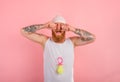 Cry man with beard and tattoos acts like a small newborn Royalty Free Stock Photo