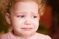 Crying baby face closeup Royalty Free Stock Photo