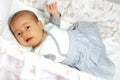 Crying baby girl in her crib Royalty Free Stock Photo