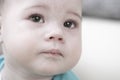 Crying baby 6 7 months, portrait close-up. Sad face of a child with tears in his eyes, baby tears girl kid boy baby Royalty Free Stock Photo