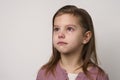 Crying child girl against white background Royalty Free Stock Photo