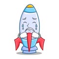 Crying cute rocket character cartoon