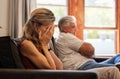 Crying, divorce and fight with a senior woman sad in her home after an argument with her husband. Depression, stress and