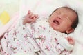 Crying Japanese new born baby girl Royalty Free Stock Photo