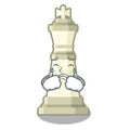 Crying king chess above wooden cartoon table Royalty Free Stock Photo