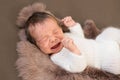 Crying newborn baby, baby`s tears, colic and impaired child health Royalty Free Stock Photo