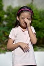 Crying Petite Filipina Girl Child