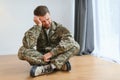 Crying professional soldier with depression and trauma after war Royalty Free Stock Photo