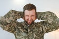 Crying professional soldier with depression and trauma after war Royalty Free Stock Photo