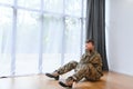 Crying professional soldier with depression and trauma after war Royalty Free Stock Photo